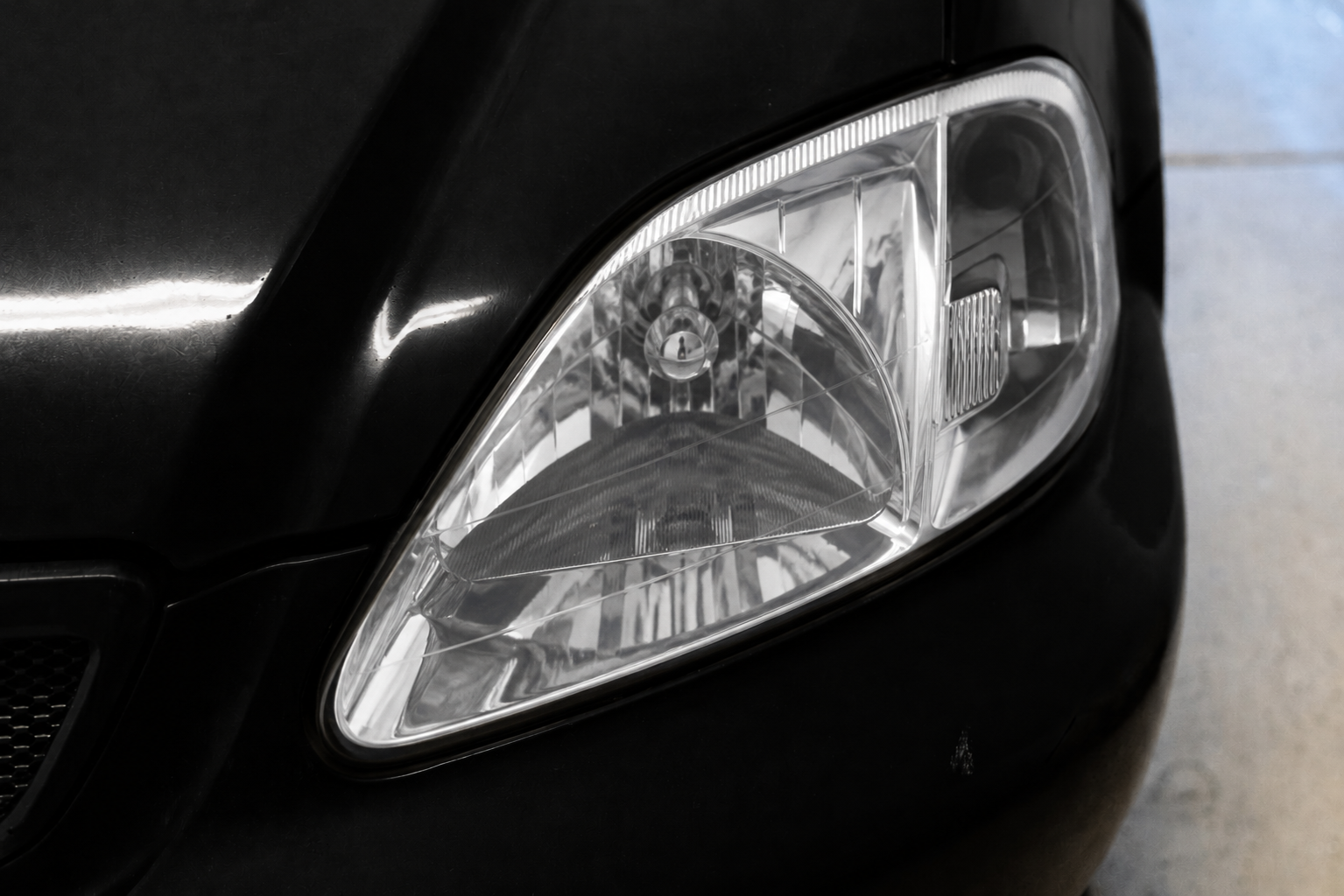 Professionally restored headlight — crystal clear